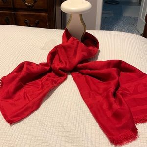 Never worn. With Tags. Red Scarf . Silk and Wool . Has a fringed edging.